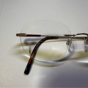 Gold rimless titanium glasses